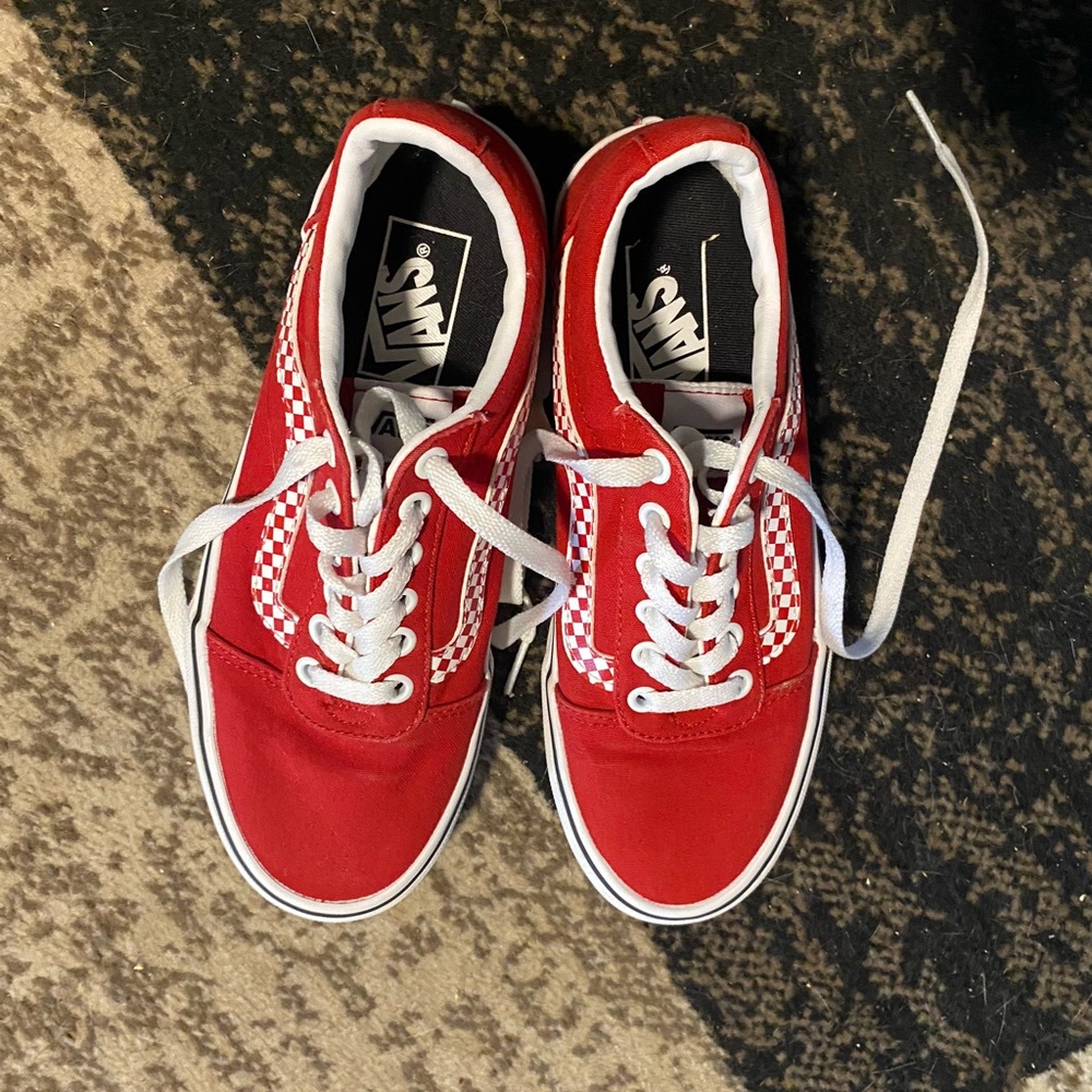 Red and white Vans in excellent condition
